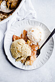 Baked apple cobbler with ice cream