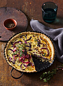 Red onion quiche with cheese and thyme