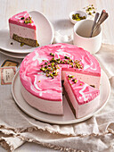 Strawberry and pistachio mousse cake