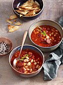 Tomato soup with white beans and sausage