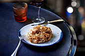 Rabbit with capers and ribbon noodles