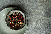 Colorful peppercorns in a bowl