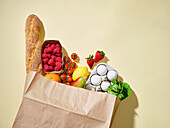 Paper shopping bag with organic food