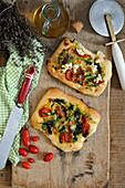 Homemade mini focaccia with vegetable topping
