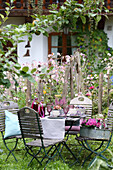 Autumn garden table in front of farmhouse