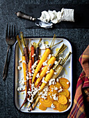 Roasted carrots and yellow beets with goat's cheese