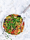 Vegetable and olive paella