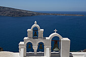 White Bell Tower Of A Church With View Of The Aegean Sea; Firostefani, Sanotrini, Cyclades, Greek Islands, Greece