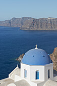 Blue Domed Churches On A Cliff Overlooking The Caldera; Oia, Santorini, Cyclades, Greek Islands, Greece