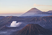 Tengger Caldera With Steaming Mount Bromo, Mount Batok And Mount Semeru In The Background, Seen From The Western Viewpoint At Dawn, Bromo Tengger Semeru National Park, East Java, Indonesia
