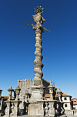 Column Monument Against A Blue Sky; Oporto, Portugal