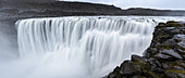 Mist From A Waterfall In Northern Iceland; Dettifoss, Iceland