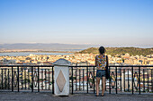 Girl Enjoying The Panoramic View Of The City Of Cagliari; Cagliari, Sardinia, Italy
