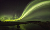 Northern Lights Over A River And Farm In Northeast Iceland; Iceland