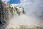 Cloud Of Spray Beneath Sunny Iguazu Falls; Parana, Brazil
