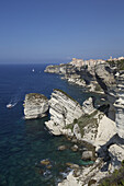 Bonifacio Citadel Perched On Dramatic White Cliffs Overlooking Blue Sea