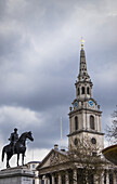 Statue Of King George Iv In Front Of St Martin-In-The-Fields Church In Trafalgar Square, Westminster; London, England