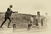 Statue of a naked man in the Pompeii ruins; Pompeii, Italy