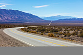 Road going through the arid and mountainous landscape of Los Cardones National Park; Salta Province, Argentina