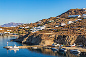 Small fishing boats docked in Mykonos new port marina; Mykonos Town, Mykonos Island, Greece