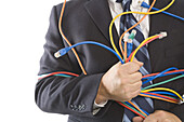 Close-up of Businessman Holding CAT5 Cables