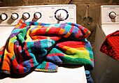 Towel and Dryer in Laundry Room