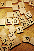 Board Game Pieces Spelling Out I Love You