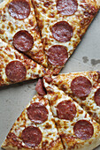 Overhead View of Sliced Pepperoni Pizza in Box