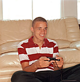 Teenage Boy Playing Video Game