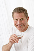 Portrait of Man With Glass of Water