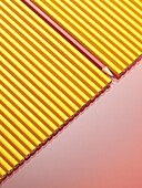 Row of Yellow Pencils With One Red Pencil