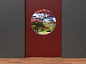 Digital Illustration of Grey and Red Concrete Walls with view through Round Window into Japanese Garden