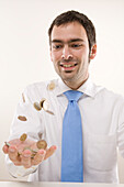 Man Tossing Coins