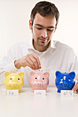 Man with Piggy Banks