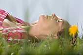 Woman Lying Down in Meadow