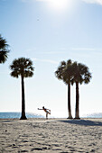 Man Practicing Yoga on Beach, Hernando Beach, Florida, USA