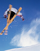 Looking Up at Skier Jumping in Air, Jungfrau Region, Switzerland