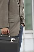 Man Holding Briefcase