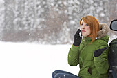 Woman Using Cellular Telephone Outdoors