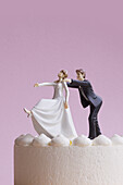 Wedding Cake Figurines, Groom Grabbing Runaway Bride