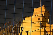 Close-Up Of Office Building Exterior With Reflection; Montreal, Quebec, Canada