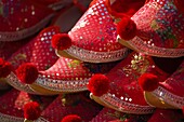 Close-Up Of Red Slippers At Market; Istanbul, Turkey