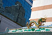 Dragon On Roof Of Chinese Temple Near Saphan Taksin Skytrain Station; Bangkok, Thailand