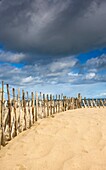 A Wooden Fence At A Beach