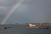 Regenbogen über dem Wasser, Insel Iona, Schottland