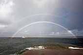 Regenbogen über dem Wasser, Insel Iona, Schottland