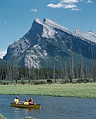 Canoeing In The Mountains, Banff, Alberta, Canada