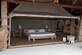 Ein Bett in der Shompole Lodge, Kenia, Afrika
