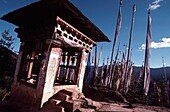 Stups With Prayer Wheels Surrounded By Prayer Flags