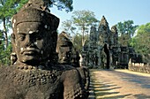 Stone Statues At South Gate Of Angkor Thom